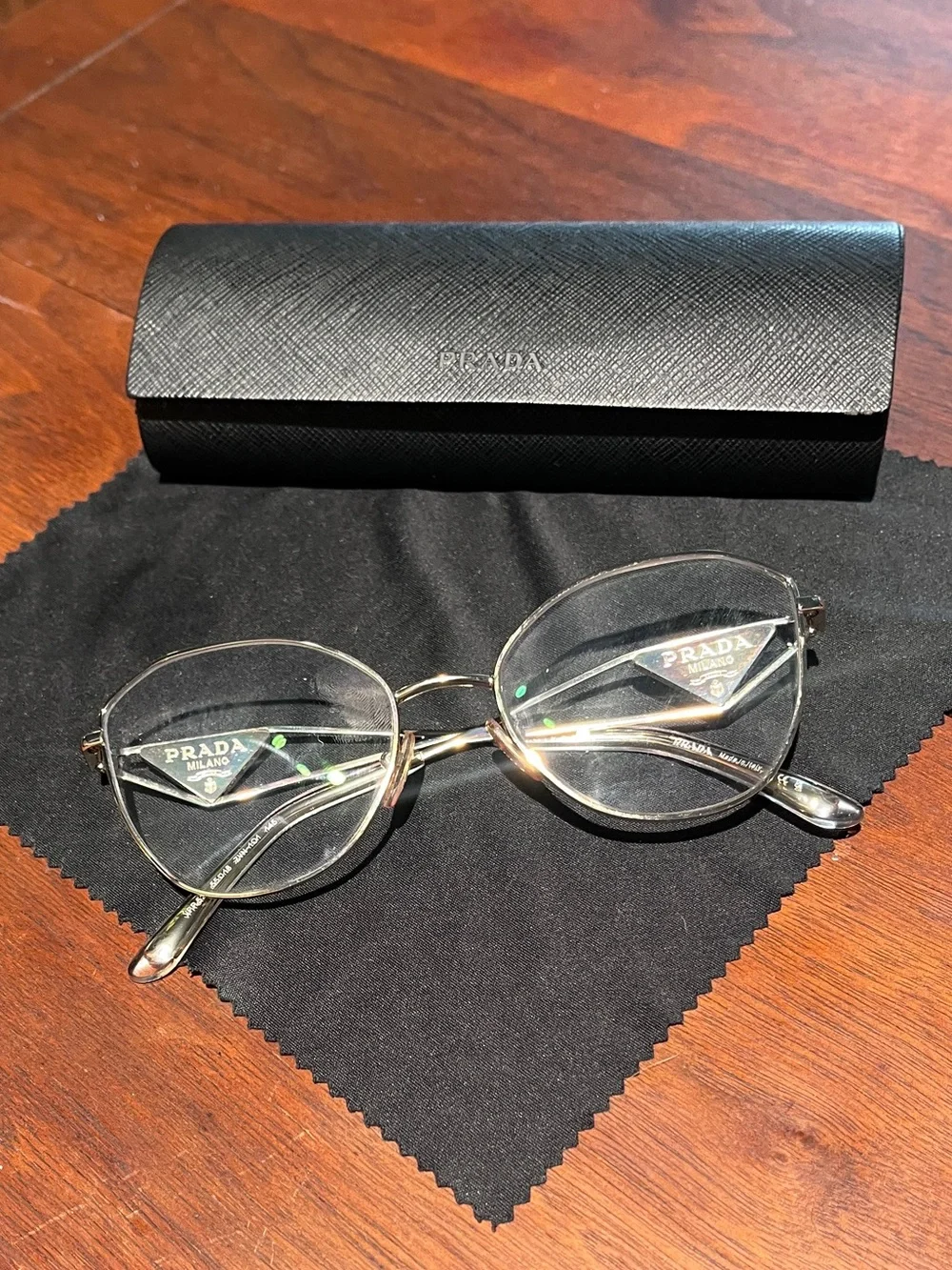 Prada - eyeglass frames - PR 52ZV - pale gold